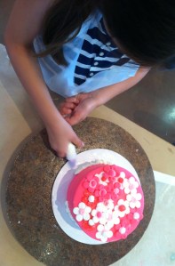 Children have "hands on" experience for decorating cakes.